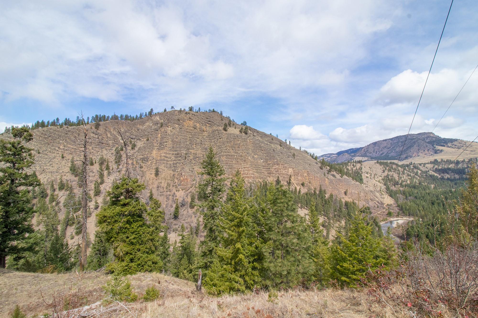 Undeveloped canyon and benchland terrain typical of SE Kelowna ALR land