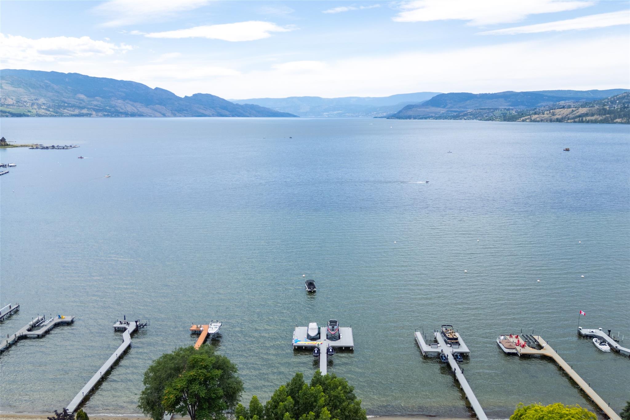 Aerial view of Okanagan Lake and private docks near Kelowna